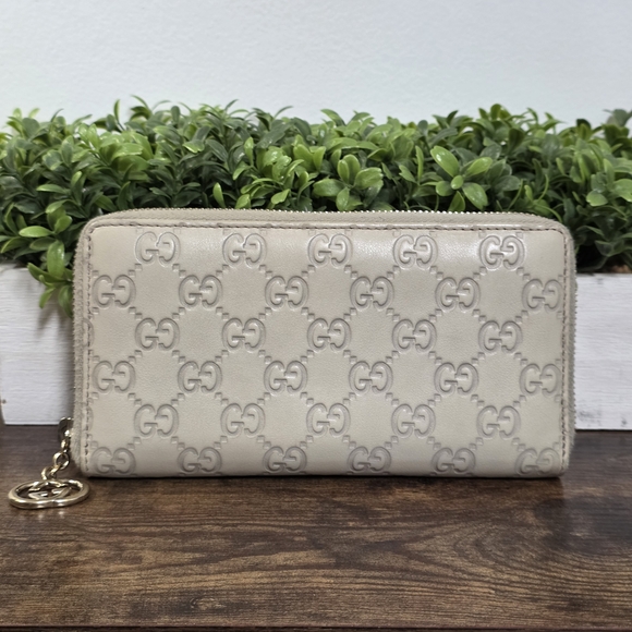 Gucci Handbags - Gucci Guccissima Signature Leather Zip Around Wallet